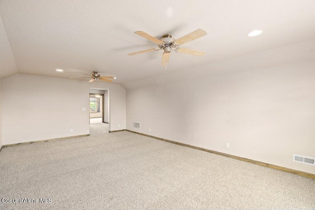 15360 N Nixon Loop, Rathdrum, ID 83858 - unfurnished room featuring lofted ceiling, light carpet, baseboards, recessed lighting, and ceiling fan
