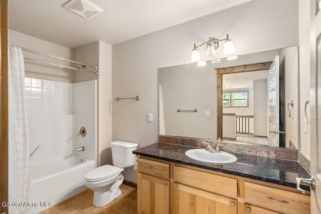 15360 N Nixon Loop, Rathdrum, ID 83858 - bathroom featuring toilet, shower / bathtub combination with curtain, vanity, and a textured ceiling