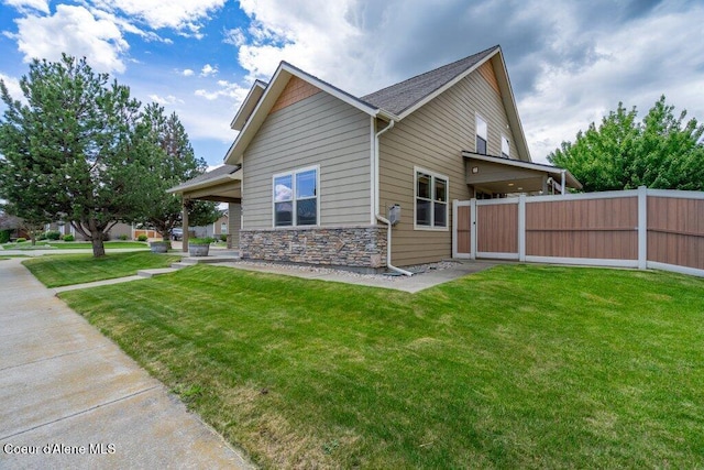 15360 N Nixon Loop, Rathdrum, ID 83858 - view of side of home with stone siding