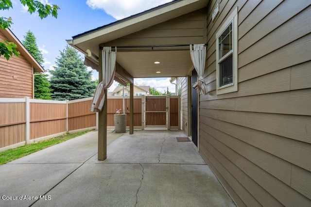 15360 N Nixon Loop, Rathdrum, ID 83858 - view of patio featuring a gate and a carport