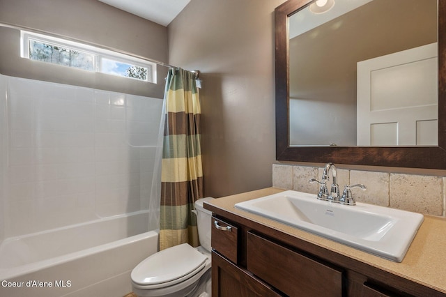 29264 N Ramsey Rd, Athol, ID 83801 - full bathroom featuring toilet, shower / bath combination with curtain, backsplash, and vanity