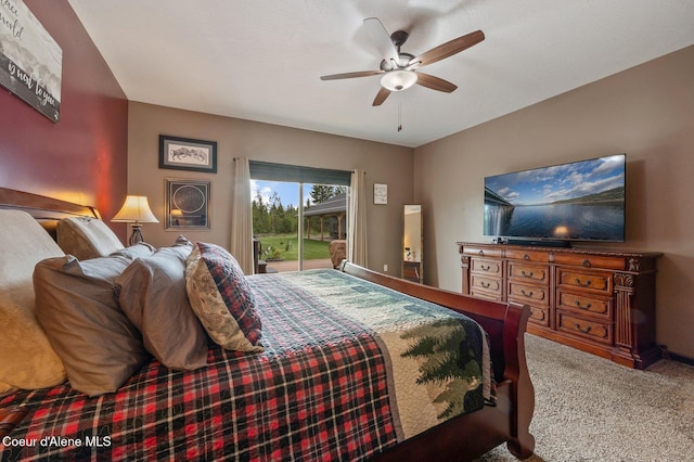 29264 N Ramsey Rd, Athol, ID 83801 - carpeted bedroom featuring access to outside and ceiling fan