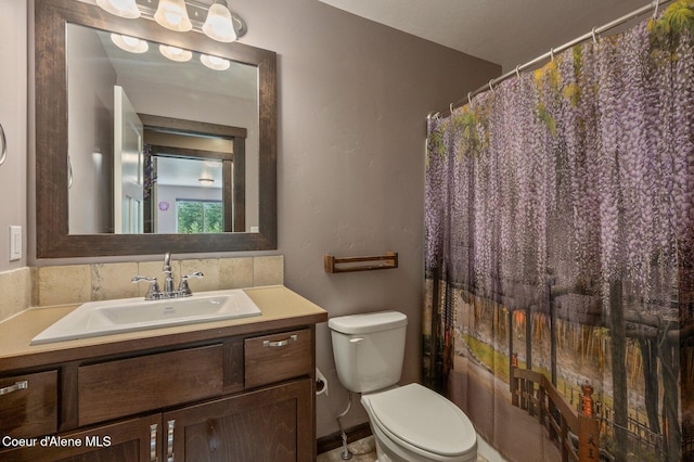 29264 N Ramsey Rd, Athol, ID 83801 - bathroom with toilet, vanity, and a shower with shower curtain
