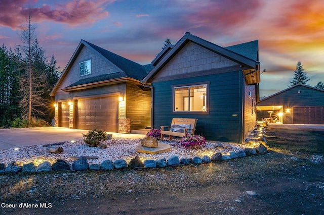 29264 N Ramsey Rd, Athol, ID 83801 - view of front of property with a garage and concrete driveway