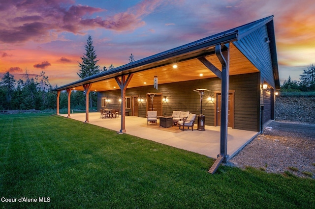 29264 N Ramsey Rd, Athol, ID 83801 - back of property with a patio, a yard, and an outdoor living space