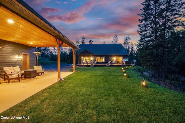 29264 N Ramsey Rd, Athol, ID 83801 - view of green lawn with outdoor lounge area and a patio