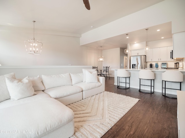 898 E Railroad Ave, Post Falls, ID 83854 - living area featuring a chandelier, dark wood-style flooring, and recessed lighting
