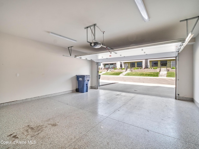 898 E Railroad Ave, Post Falls, ID 83854 - garage with a garage door opener and baseboards