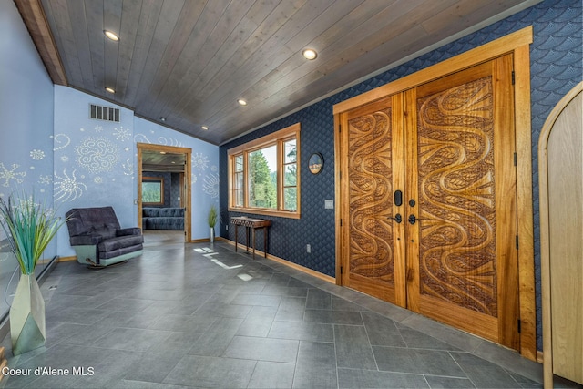 23 S Lightning Spur Ln, Coeur Dalene, ID 83814 - entryway featuring wallpapered walls, vaulted ceiling, baseboards, wood ceiling, and recessed lighting