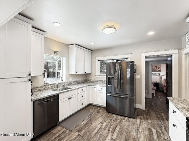 372 E Jefferson Ave, Priest River, ID 83856 - kitchen featuring black appliances, a sink, plenty of natural light, dark wood-style flooring, and recessed lighting