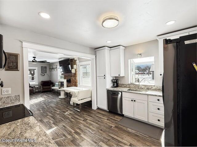 372 E Jefferson Ave, Priest River, ID 83856 - kitchen with dishwasher, freestanding refrigerator, a sink, healthy amount of natural light, and recessed lighting