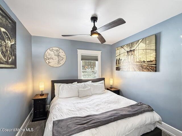 372 E Jefferson Ave, Priest River, ID 83856 - carpeted bedroom with baseboards and ceiling fan