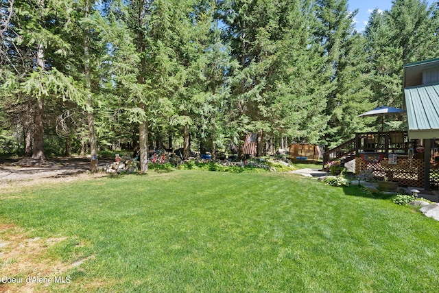 3470 W Seasons Rd, Rathdrum, ID 83858 - view of grassy yard with a wooden deck