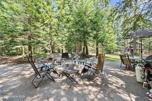3470 W Seasons Rd, Rathdrum, ID 83858 - view of patio / terrace with an outdoor fire pit