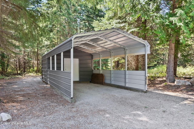 3470 W Seasons Rd, Rathdrum, ID 83858 - view of parking featuring a detached carport and gravel driveway