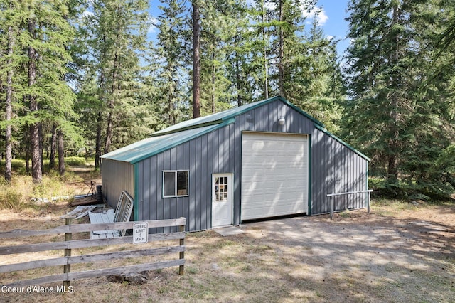 3470 W Seasons Rd, Rathdrum, ID 83858 - view of outdoor structure with driveway and view of scattered trees