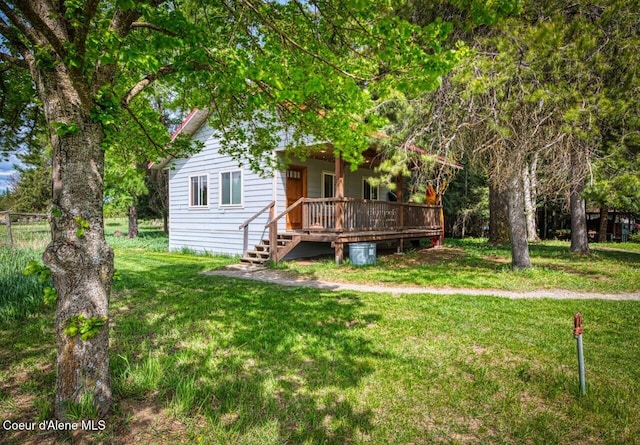 348 Kootenai Trail Rd, Naples, ID 83847 - view of grassy yard with a deck