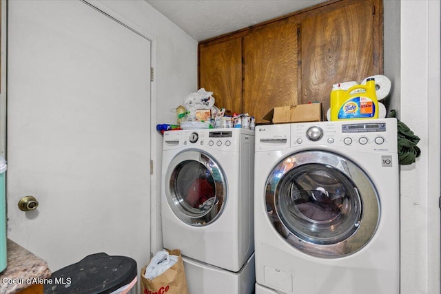 2707-2709 N 10th St, Coeur Dalene, ID 83815 - clothes washing area featuring separate washer and dryer
