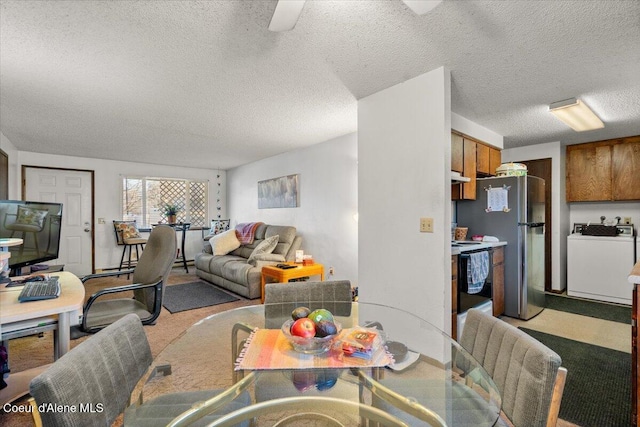 2707-2709 N 10th St, Coeur Dalene, ID 83815 - dining area featuring washer / clothes dryer, a textured ceiling, light carpet, and a ceiling fan