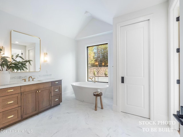 L2B5 E Winray Dr, Hayden, ID 83835 - bathroom with a soaking tub, vanity, vaulted ceiling, and marble finish floors