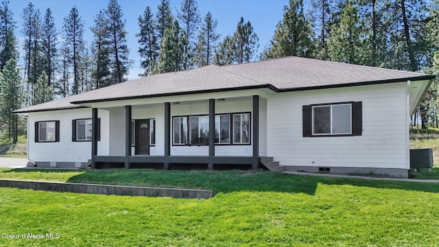 320 S River St, Rockford, WA 99030 - back of house with a lawn and roof with shingles
