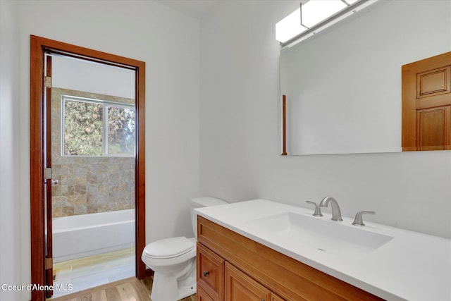 320 S River St, Rockford, WA 99030 - full bathroom with toilet, vanity, a bathtub, and wood finished floors