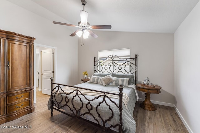 18924 E Fredrick Ave, Otis Orchards, WA 99027 - bedroom with baseboards, light wood-style flooring, lofted ceiling, and a ceiling fan