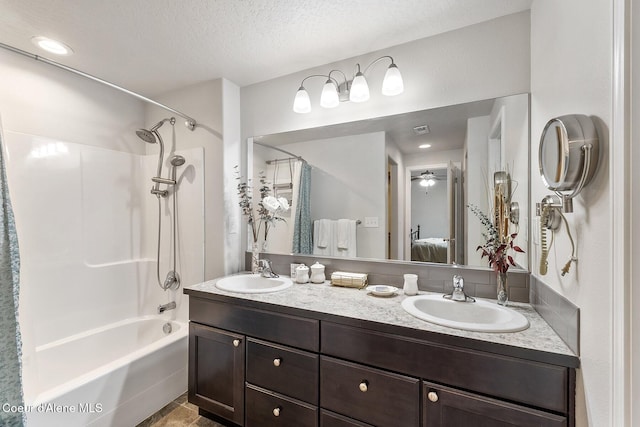 18924 E Fredrick Ave, Otis Orchards, WA 99027 - full bathroom featuring ensuite bath, tub / shower combination, double vanity, and a textured ceiling