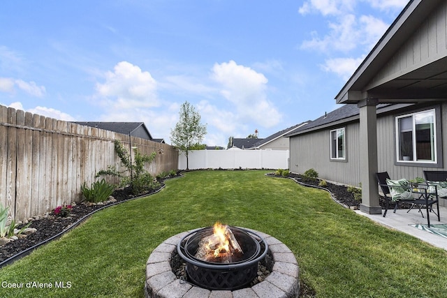 18924 E Fredrick Ave, Otis Orchards, WA 99027 - view of yard featuring a fire pit and a patio area