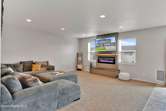 6314 Irish Dr, Rathdrum, ID 83858 - living room featuring recessed lighting, baseboards, and carpet floors