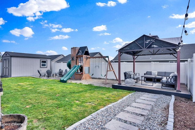 6314 Irish Dr, Rathdrum, ID 83858 - view of yard featuring outdoor lounge area, a playground, an outdoor structure, and a deck