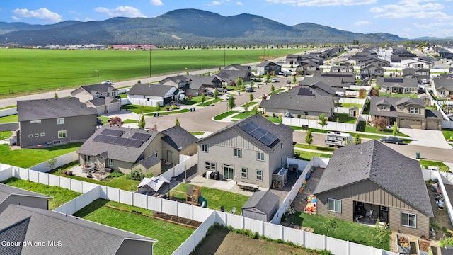 6314 Irish Dr, Rathdrum, ID 83858 - aerial view of residential area featuring a mountain backdrop and a golf club