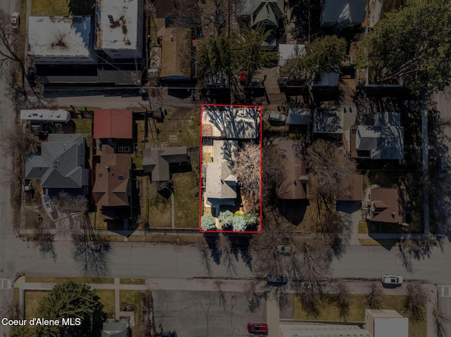 aerial view of residential area with property boundaries highlighted