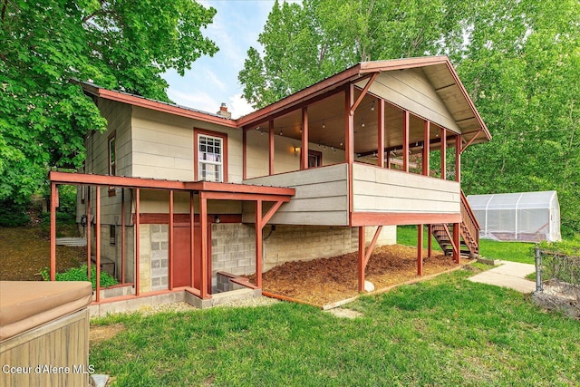 342 Summit Blvd, Priest River, ID 83856 - view of front of house featuring an exterior structure, an outdoor structure, a front lawn, and a chimney