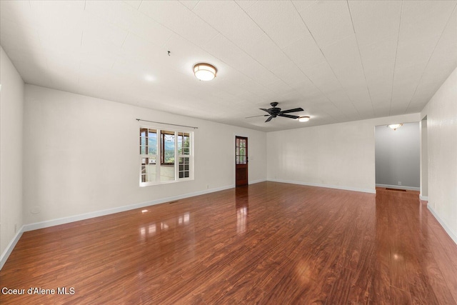 342 Summit Blvd, Priest River, ID 83856 - empty room featuring wood finished floors, ceiling fan, and baseboards
