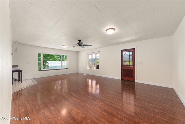 342 Summit Blvd, Priest River, ID 83856 - unfurnished living room with wood finished floors, ceiling fan, and baseboards