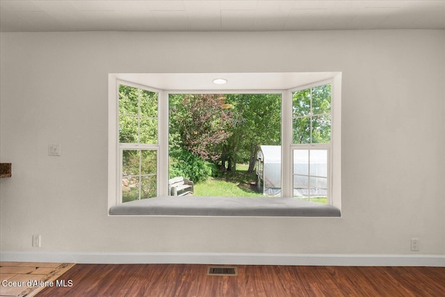 342 Summit Blvd, Priest River, ID 83856 - empty room with baseboards, healthy amount of natural light, and wood finished floors