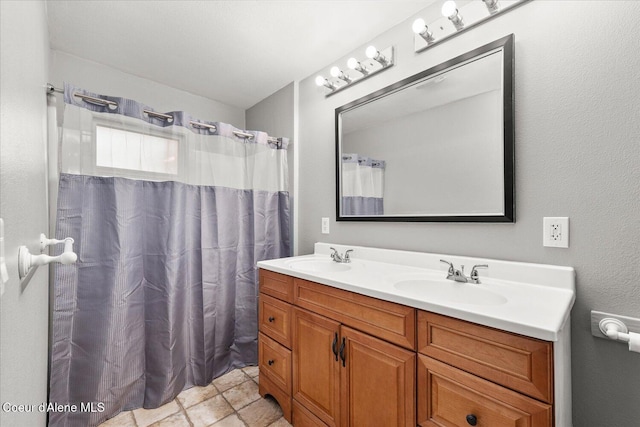 342 Summit Blvd, Priest River, ID 83856 - bathroom featuring double vanity and a shower with shower curtain