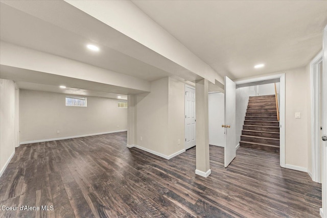 342 Summit Blvd, Priest River, ID 83856 - basement featuring dark wood-style flooring, stairs, baseboards, and recessed lighting