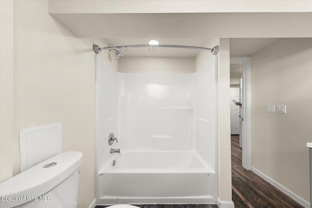 342 Summit Blvd, Priest River, ID 83856 - full bath with wood finished floors, baseboards, washtub / shower combination, and toilet