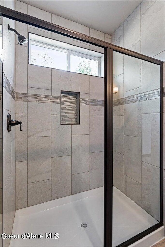 2060 E Plaza Ct, Post Falls, ID 83854 - bathroom featuring plenty of natural light and a shower stall
