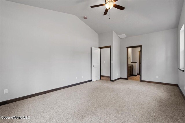 2060 E Plaza Ct, Post Falls, ID 83854 - unfurnished bedroom featuring lofted ceiling, light carpet, baseboards, connected bathroom, and a ceiling fan
