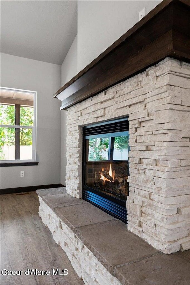 2060 E Plaza Ct, Post Falls, ID 83854 - detailed view of wood finished floors and baseboards