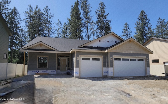 2060 E Plaza Ct, Post Falls, ID 83854 - unfinished property featuring an attached garage and driveway
