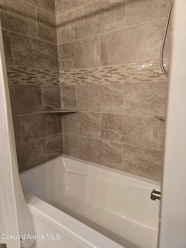 12552 N Walden Loop, Rathdrum, ID 83858 - bathroom featuring  shower combination