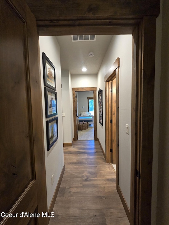 12552 N Walden Loop, Rathdrum, ID 83858 - corridor with baseboards, wood finished floors, and recessed lighting