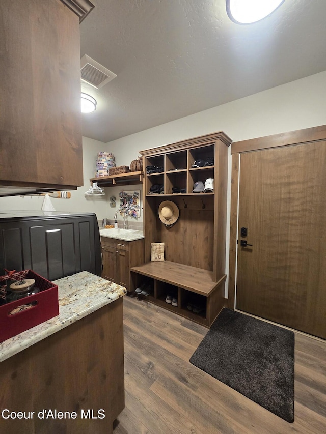 12552 N Walden Loop, Rathdrum, ID 83858 - mudroom with dark wood finished floors and attic access
