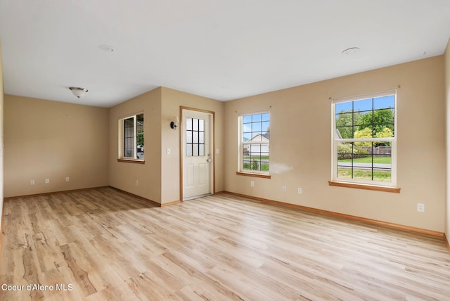 410 Humbird St, Kootenai, ID 83840 - empty room with light wood-style flooring and baseboards