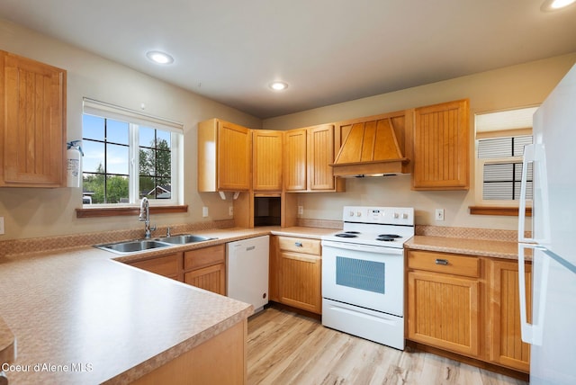 410 Humbird St, Kootenai, ID 83840 - kitchen with custom range hood, white appliances, a sink, light wood-type flooring, and recessed lighting