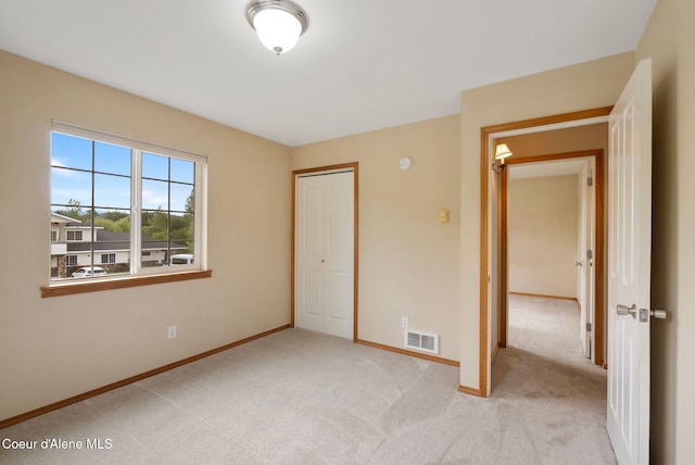 410 Humbird St, Kootenai, ID 83840 - unfurnished bedroom featuring baseboards, light carpet, and a closet